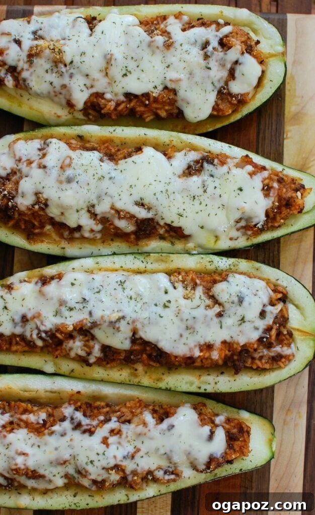 Mediterranean Zucchini Jewels 6 A close-up of a Mediterranean Zucchini Boat, showcasing the rich filling and melted cheese.
