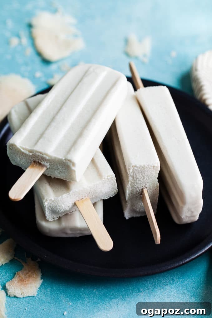 25 Ice Pop Sensations to Conquer Summer Heat 26 Exotic Coconut Lemongrass Ginger Popsicle, a refreshing and aromatic Asian-inspired frozen dessert.