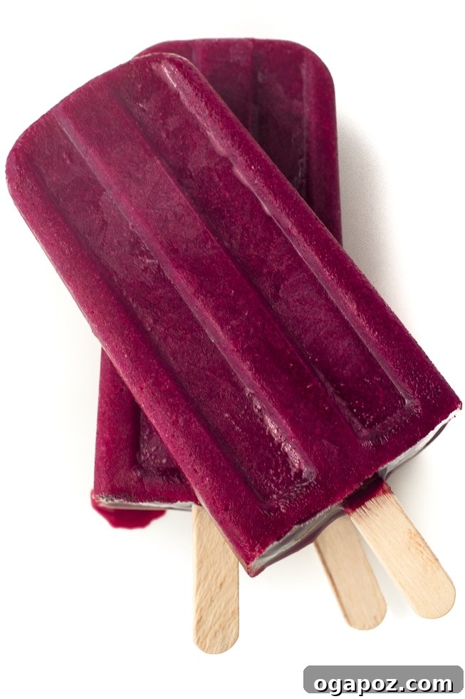 25 Ice Pop Sensations to Conquer Summer Heat 10 Classic Cherry Lemonade Popsicles, a sweet and tart frozen treat for all ages.