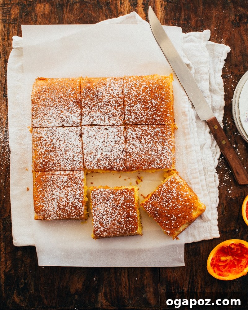 Golden Portuguese Orange Cake 2 Beautifully baked Portuguese Orange Cake, showcasing its moist texture and golden hue.