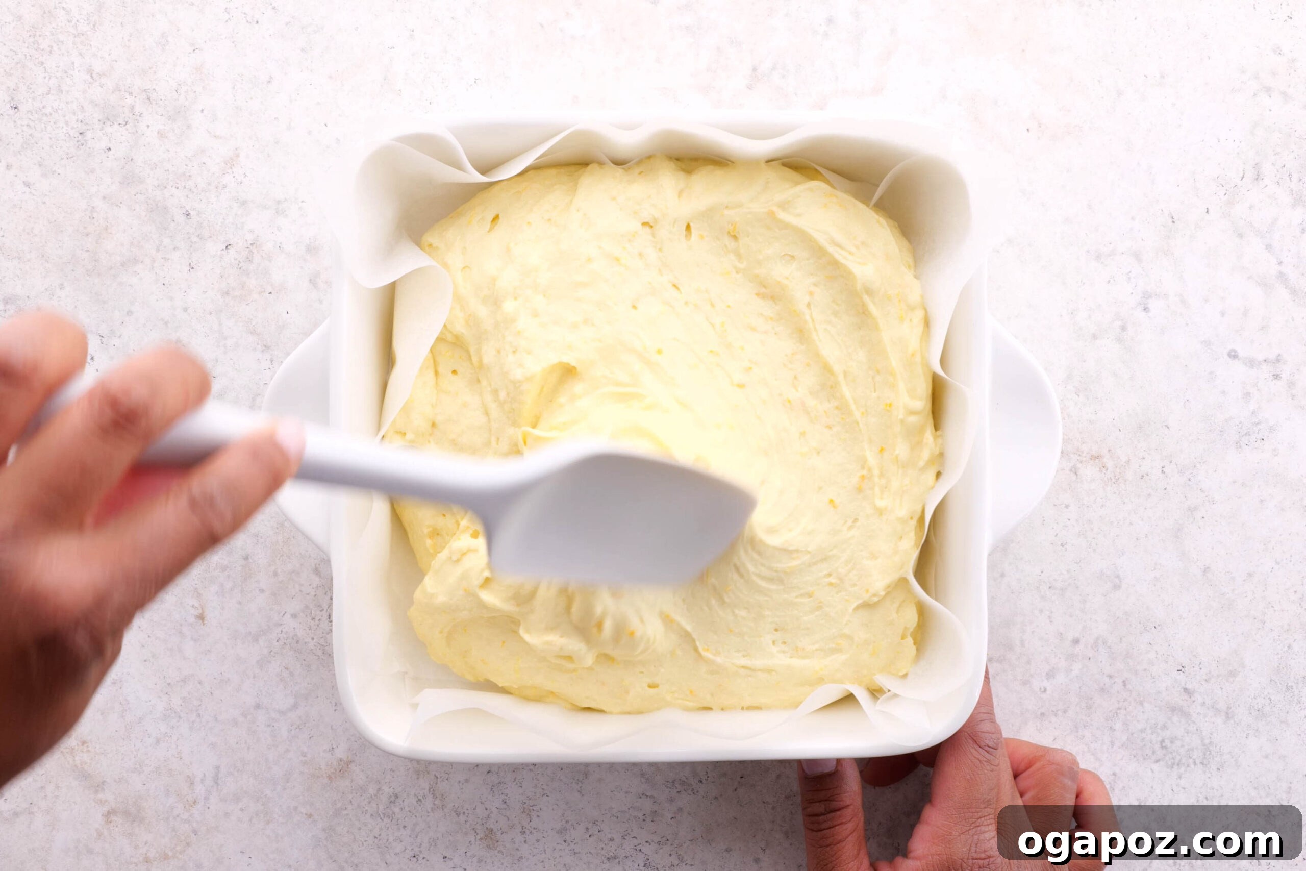 Golden Portuguese Orange Cake 7 Step 4: Folding whipped egg whites into the cake batter.