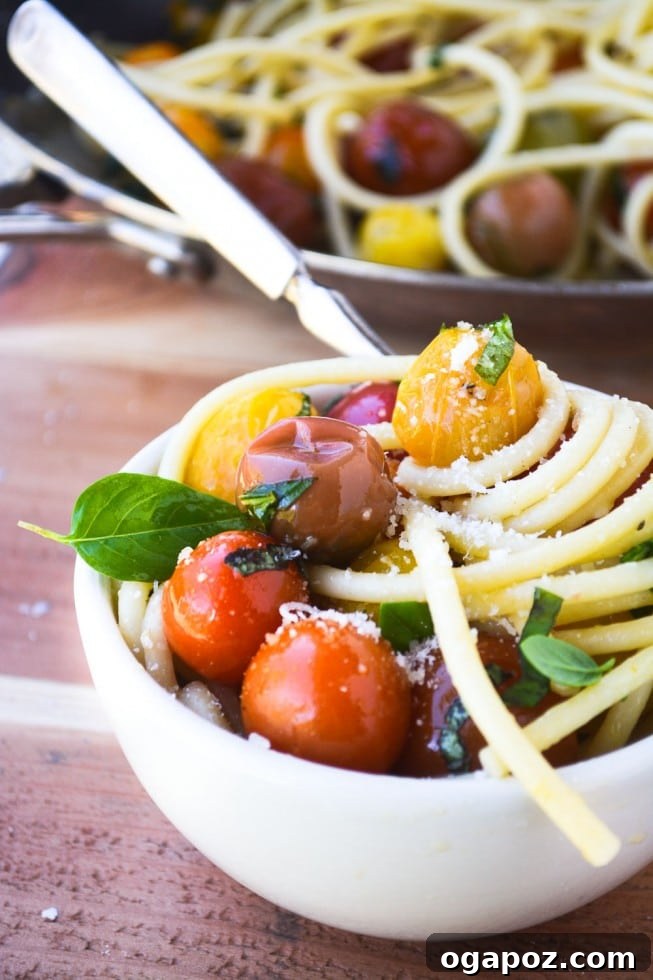 Wholesome Meals in Minutes 27 Bucatini with Burst Tomatoes, garnished with fresh basil.
