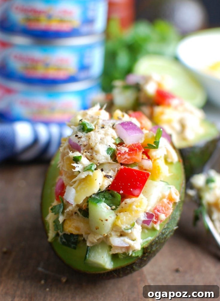 Tropical Tuna Avocado Bowls 4 Tropical Tuna Stuffed Avocado is the perfect, quick and healthy lunch at your desk or on-the-go. Fresh mango, cilantro, fresh vegetables and lime juice is mixed with Solid White Albacore Tuna and Greek Yogurt and then stuffed in a delicious avocado.