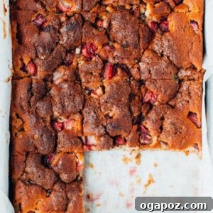 Delicious Strawberry Rhubarb Yogurt Cake with streusel topping, ready to be served.