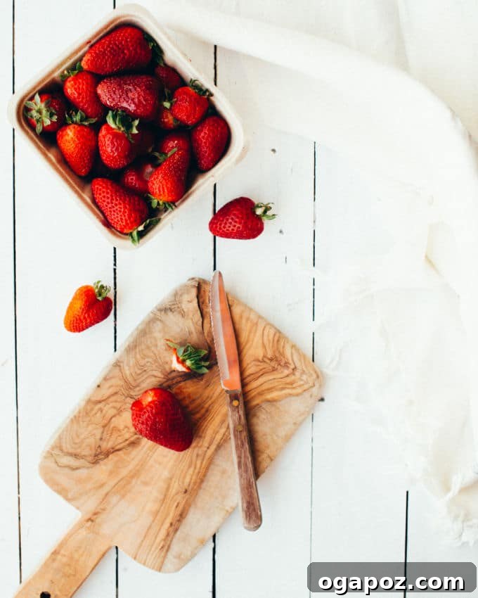 Effortless Buttermilk Drop Biscuit Strawberry Shortcakes 3 Pile of ripe, red strawberries ready for baking