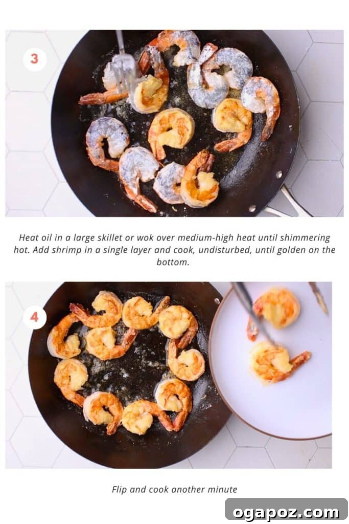 Step 2: Coating raw shrimp with cornstarch and a pinch of salt on a plate.