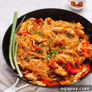 A full, delicious serving of Pad Woon Sen (Thai Glass Noodle Stir Fry) in a bowl, ready to be enjoyed.