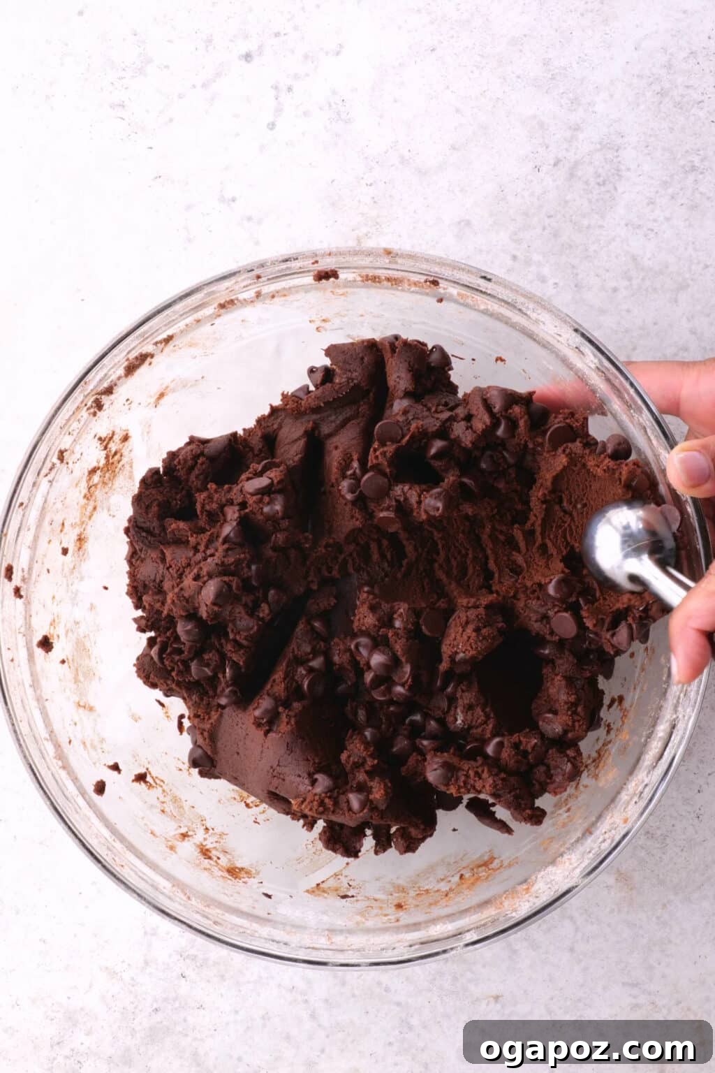 Decadent Mint Fudge Cookies 5 Step 3: Adding dry ingredients to the wet mixture for cookie dough.
