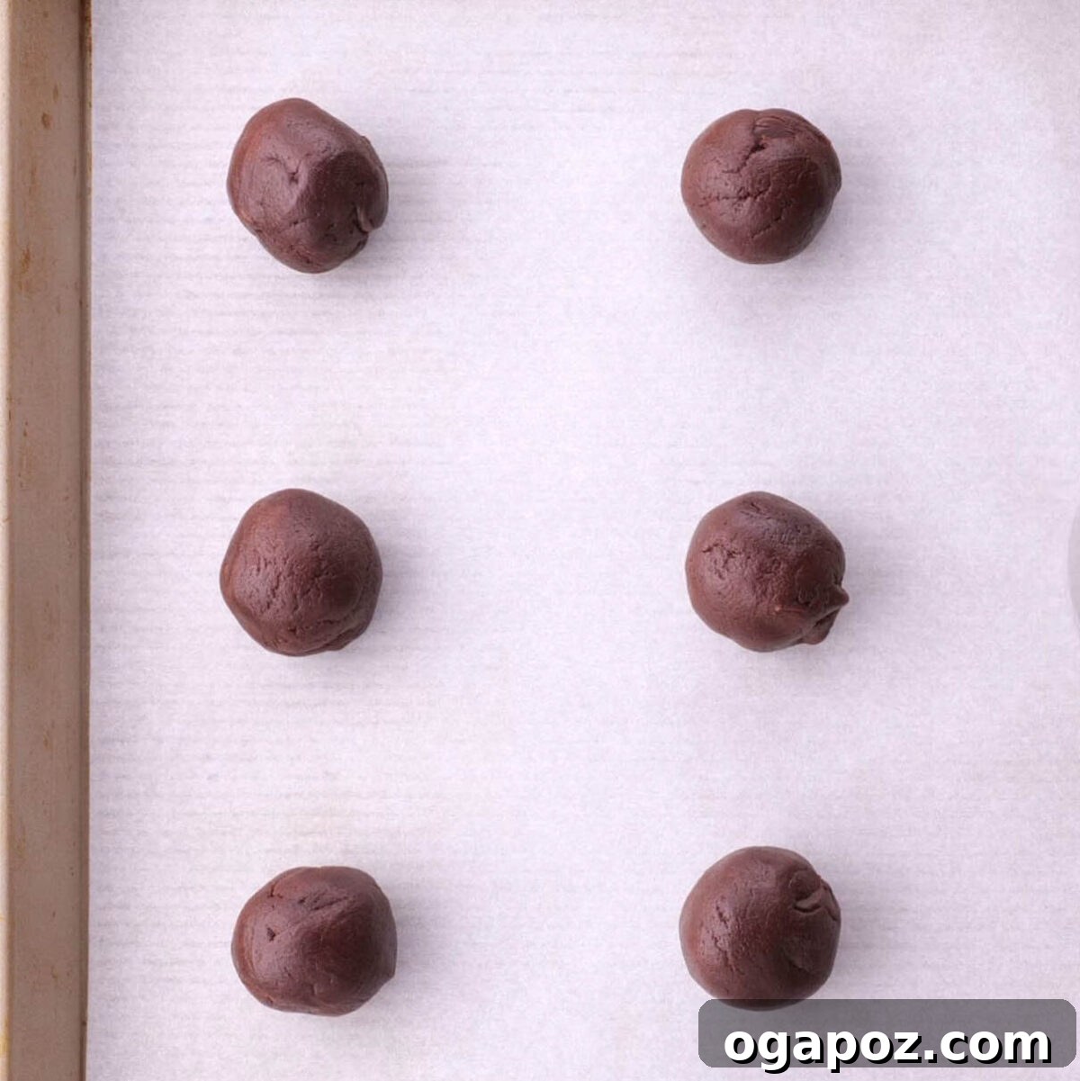 Decadent Mint Fudge Cookies 6 Step 4: Folding in chocolate chunks into the finished cookie dough.