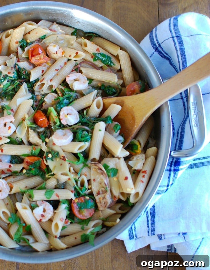 Lemon Garlic Shrimp Pasta with Kale and Artichokes 3 A vibrant bowl of Shrimp Kale Artichoke Pasta, showcasing the fresh ingredients and lemon sauce, ready for serving.