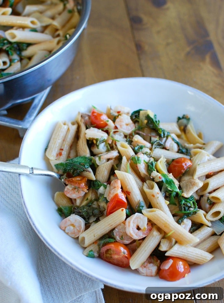 Lemon Garlic Shrimp Pasta with Kale and Artichokes 4 A selection of fresh ingredients including shrimp, kale, artichokes, tomatoes, and lemon, prepared for Shrimp Kale Artichoke Pasta.