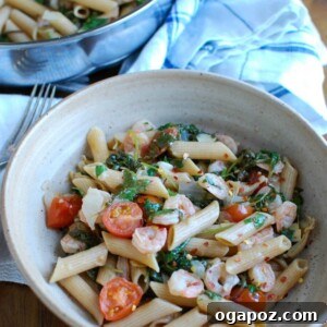 Shrimp Kale Artichoke Pasta is light, healthy and an easy meal idea. Shrimp, kale, artichokes, tomatoes and pasta and tossed in a light lemon sauce that will leave your family asking for seconds!