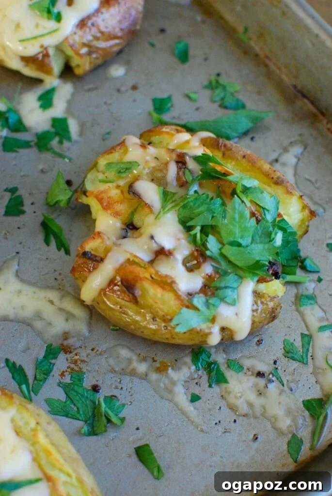 Gouda Smashed Potatoes, a crispy and cheesy side dish for holidays or special dinners, topped with melted gouda.