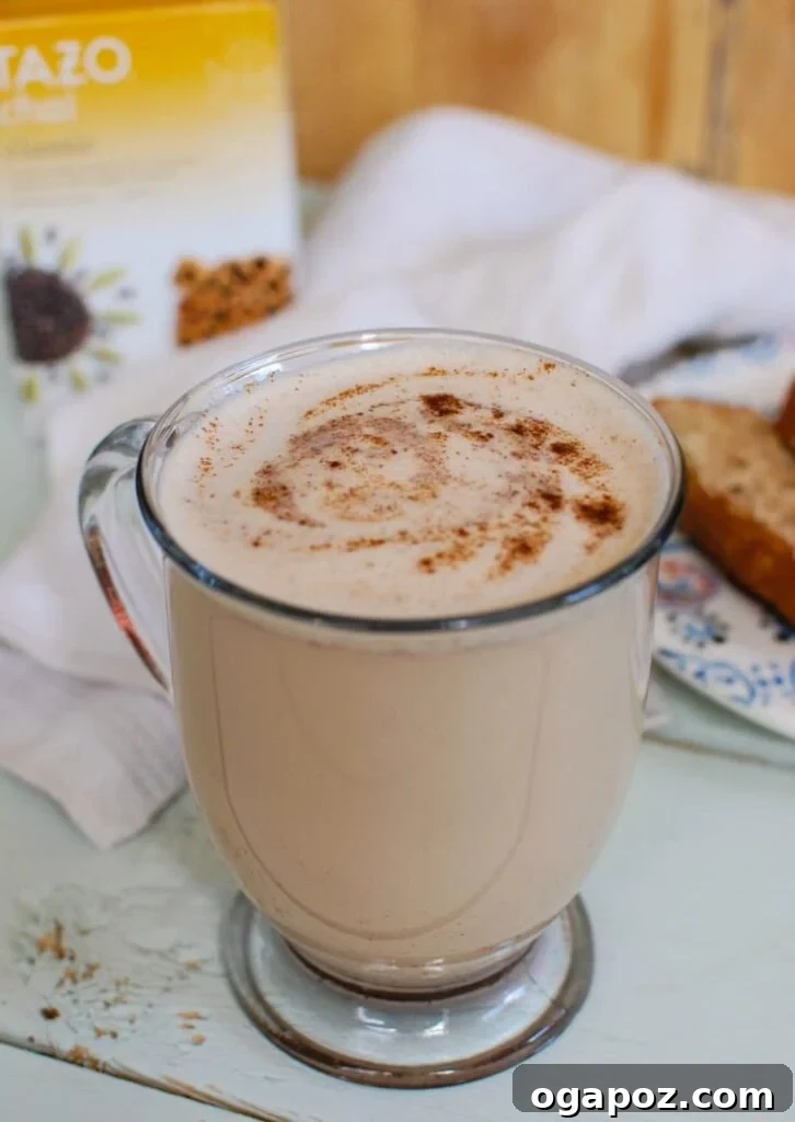 Homemade Chai Tea Latte, a cozy and spiced fall drink with cinnamon, cloves, ginger, and nutmeg.