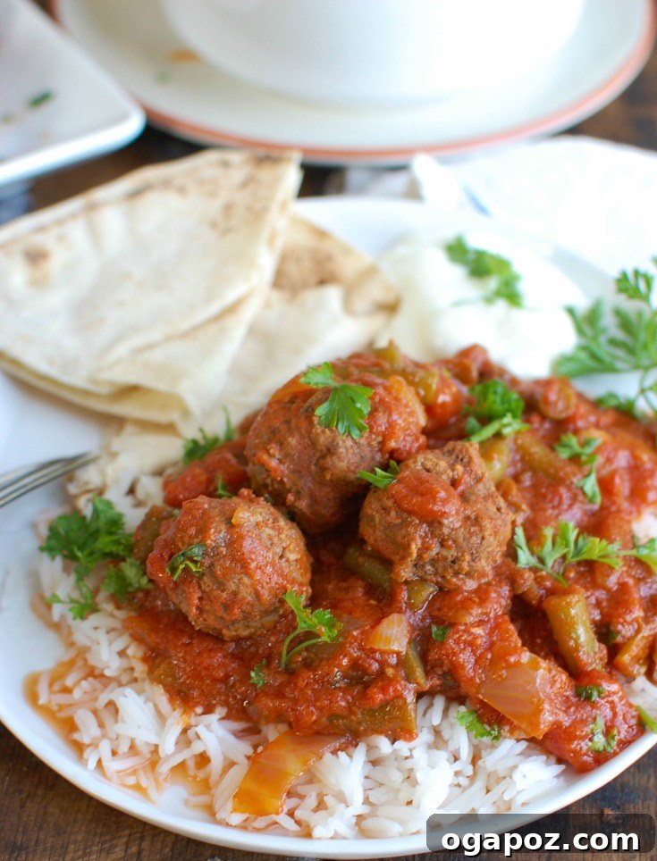 Tender Slow Cooker Mediterranean Beef Meatballs 3 Slow Cooker Mediterranean Beef Meatballs with Lebanese Green Beans is full of warm spices and slow cooks in your crockpot to make dinner easy. Beef meatballs are spiced with Mediterranean flavors and slow cooker in Lebanese green beans creating the perfect sauce paired with the meatballs and rice.