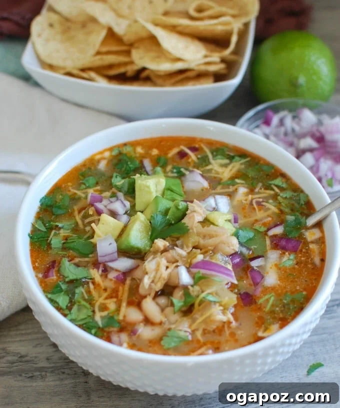 Supreme Smashed Potato Bites 7 Slow Cooker White Chicken Chili, a hearty and comforting soup for cold days.