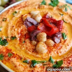 Roasted Red Pepper Greek Yogurt Hummus, perfectly blended and ready to serve.