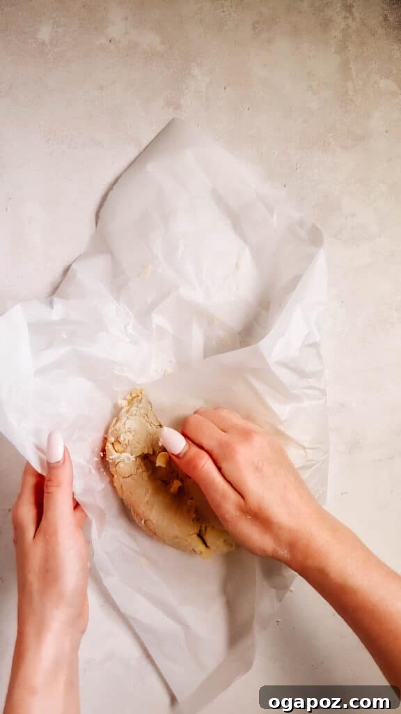 Foolproof Pie Crust You Can Make By Hand 13 The dough has formed a rough disc, ready for chilling.