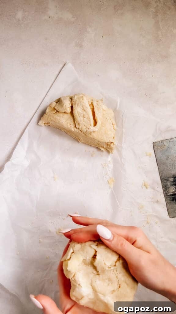 Foolproof Pie Crust You Can Make By Hand 14 Dividing the pie dough into two equal portions for rolling.