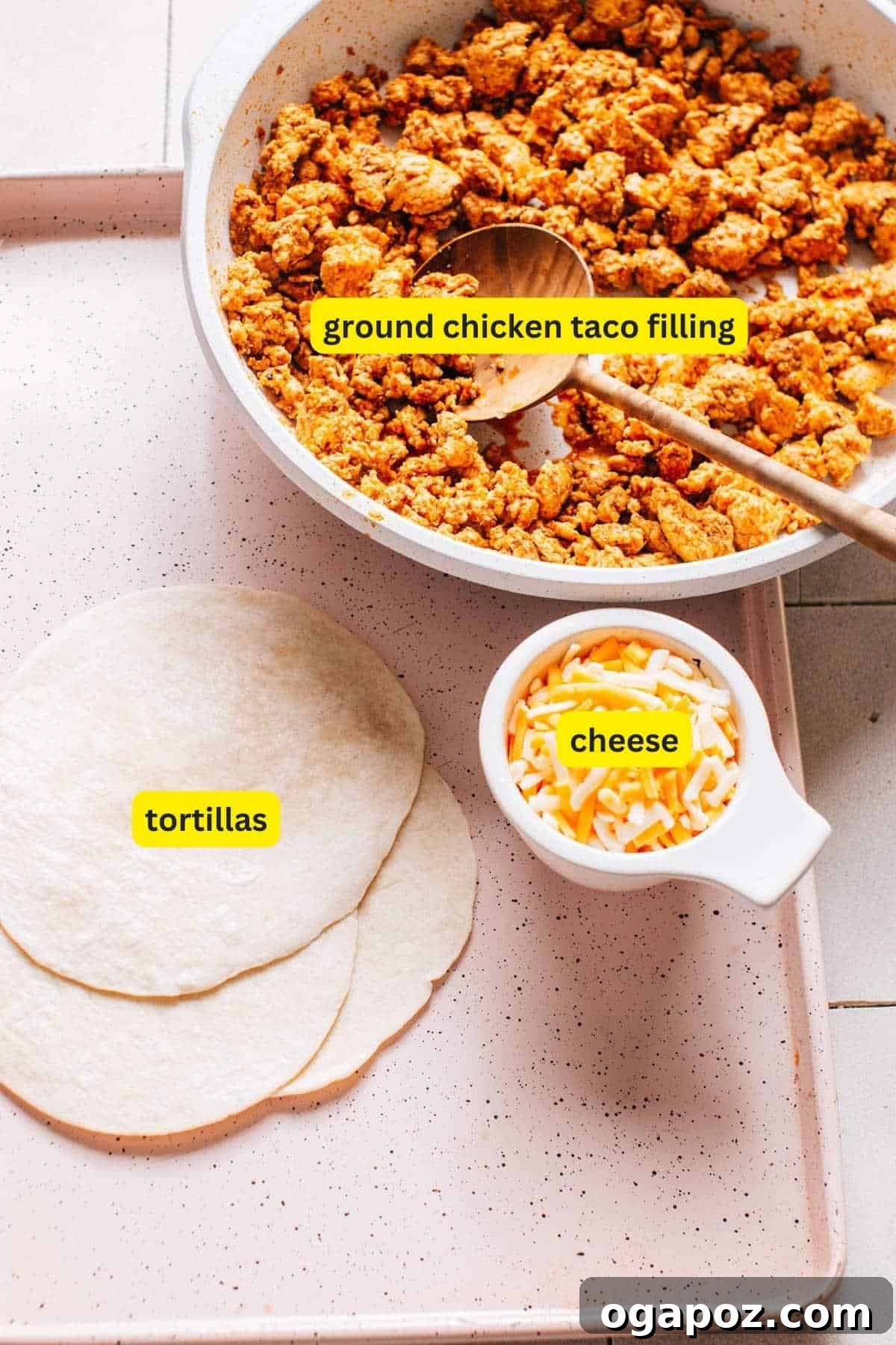 Golden Crispy Baked Chicken Tacos 3 Ingredients for crispy baked chicken tacos, includes ground chicken taco filling, tortillas and cheese.