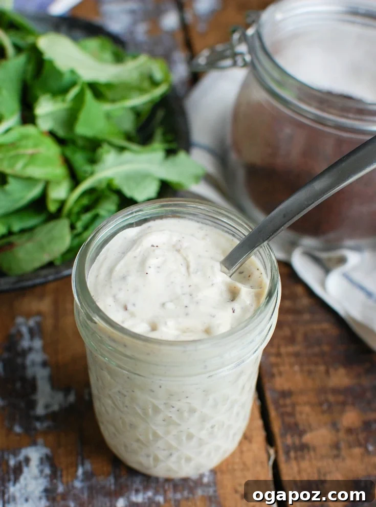 Creamy Tahini Yogurt Dressing 2 Creamy Tahini Yogurt Dressing in a glass jar, ready to be served