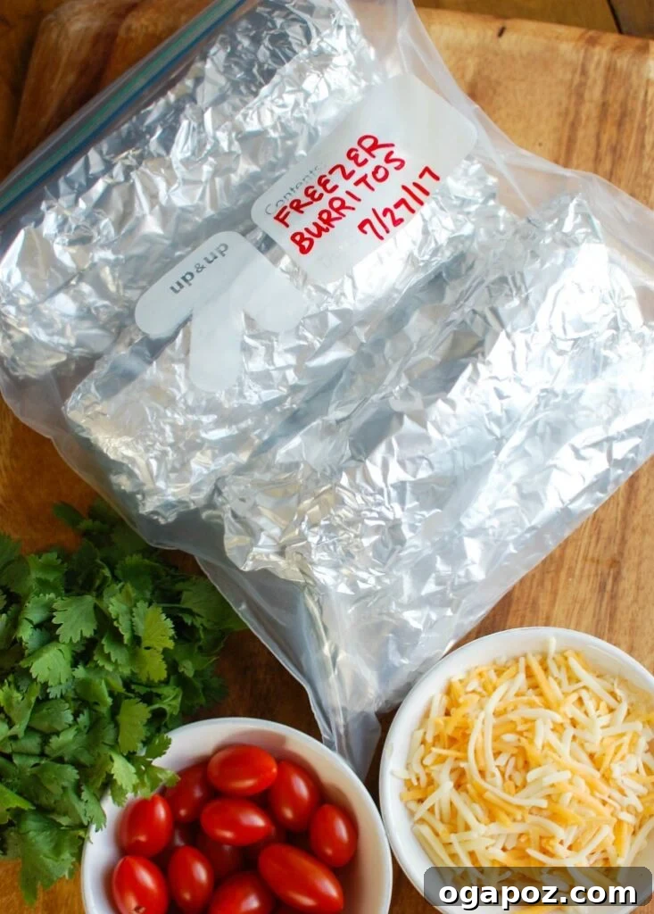 Fresh ingredients for vegetarian breakfast egg burritos laid out on a wooden board, including colorful bell peppers, onion, garlic, eggs, cheese, and various spices.