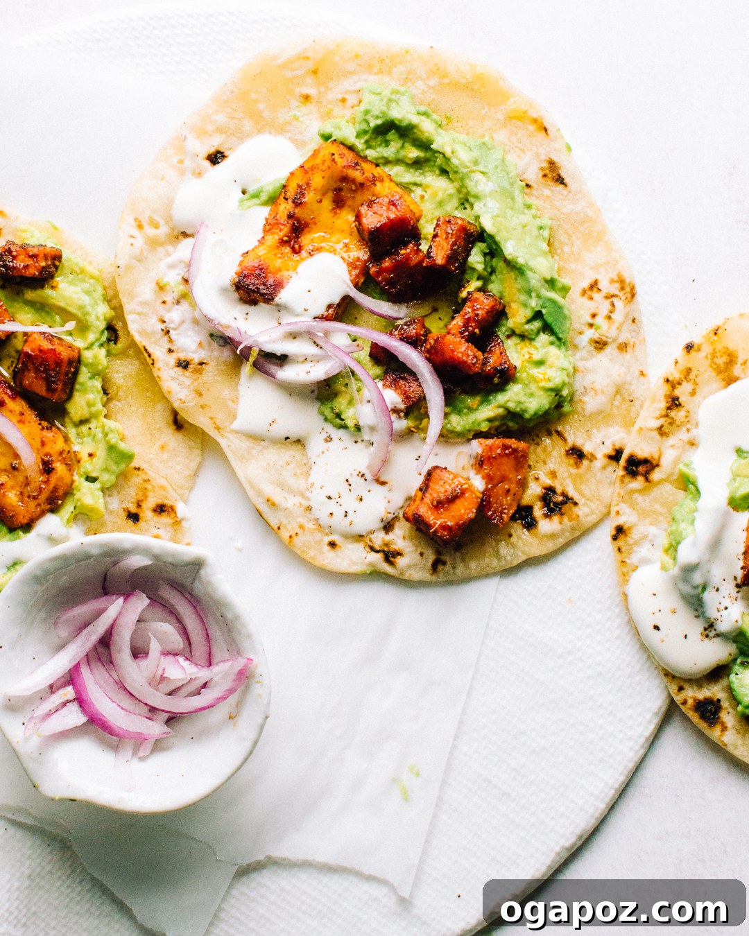 Roasted Sweet Potato Halloumi Tacos 2 Delicious sheet pan halloumi and sweet potato tacos assembled with fresh toppings.