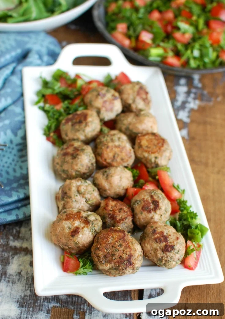 Platter of Mediterranean Baked Turkey Meatballs garnished with fresh parsley.