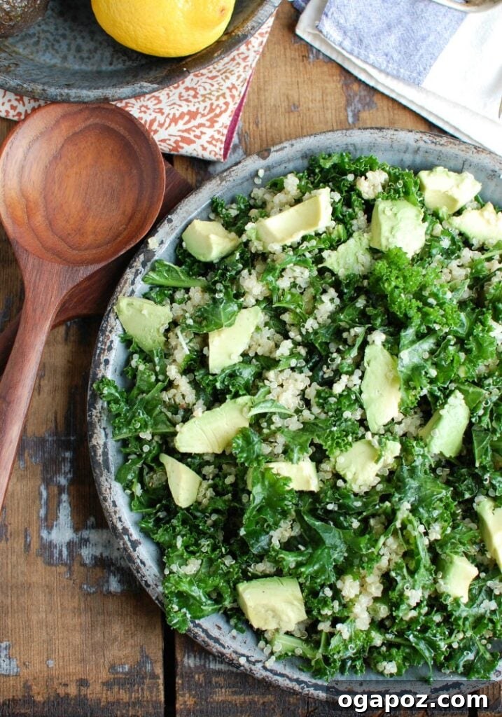 Vibrant Avocado Kale Quinoa Bowl 4 Fresh ingredients for Avocado Kale Quinoa Salad including ripe avocados, vibrant kale, cooked quinoa, and a bowl of lemon garlic dressing.