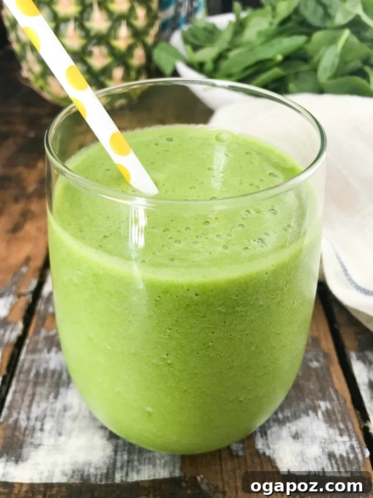 Island Green Elixir 2 This Tropical Green Smoothie is the perfect summer smoothie mixing a granny smith apple, fresh spinach, mint and frozen pineapple. You will get a good dose of your fruits and vegetables, while feeling refreshed on a hot summer day.