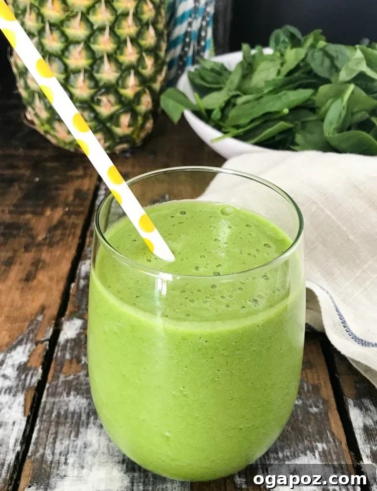 Island Green Elixir 4 This Tropical Green Smoothie is the perfect summer smoothie mixing a granny smith apple, fresh spinach, mint and frozen pineapple. You will get a good dose of your fruits and vegetables, while feeling refreshed on a hot summer day.