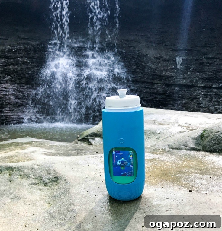Unlock Healthy Hydration with Gululu 4 A close-up of a child interacting with their Gululu water bottle pet.