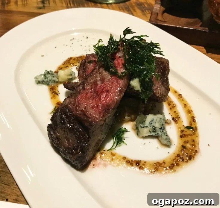 Perfectly Grilled Beef: 9 Expert Techniques 9 An elegantly prepared main course featuring Ohio beef, presented at one of the Cameron Mitchell restaurants.