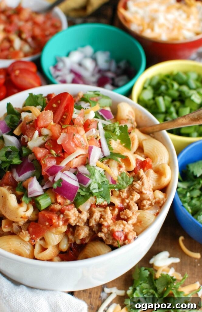 Instant Pot Taco-Spiced Turkey Pasta 3 Instant Pot Turkey Taco Pasta with garnishes