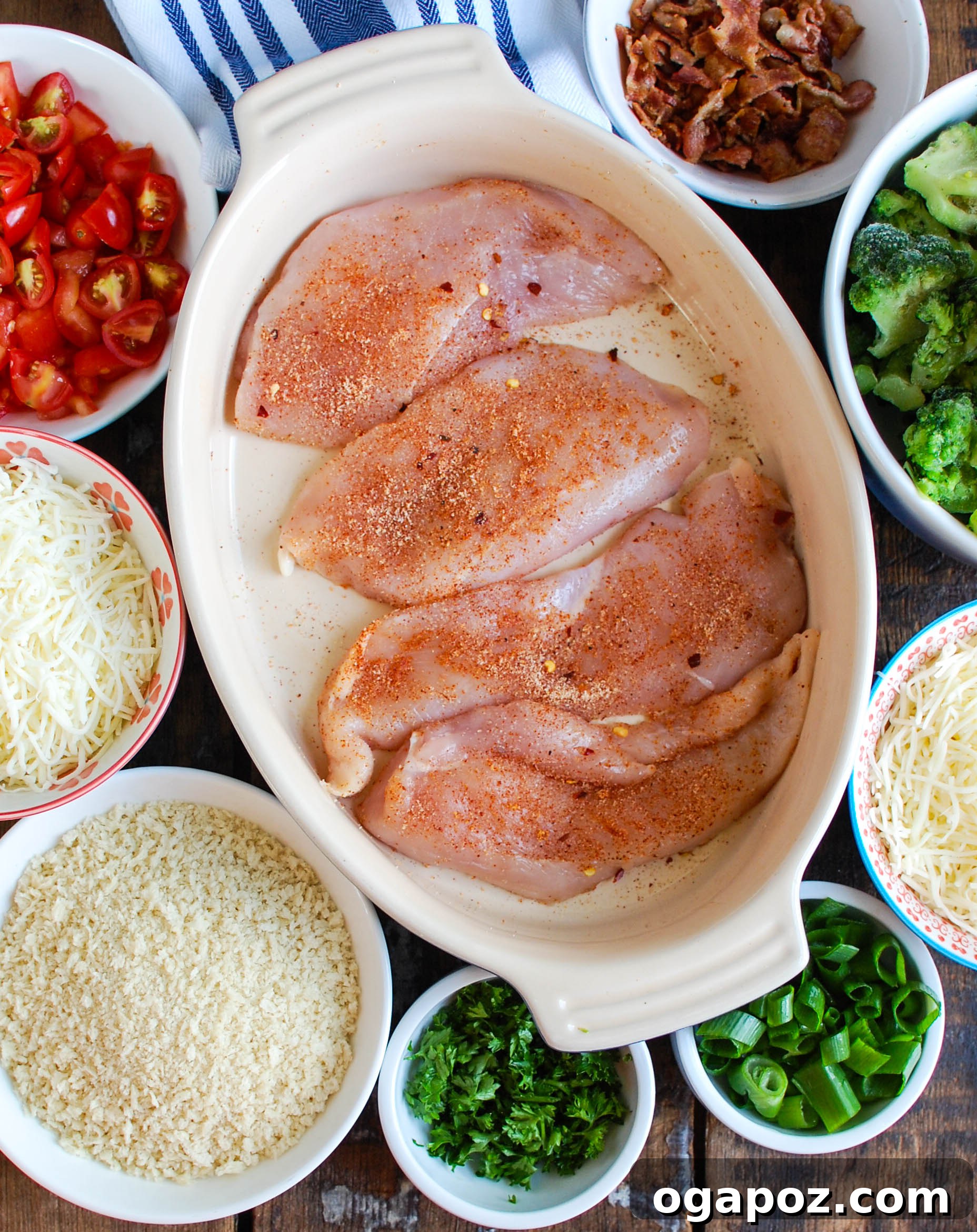 Ultimate Broccoli Cheddar Chicken 4 Prepped chicken breasts seasoned with spices and topped with chopped broccoli and crispy bacon in a casserole dish, ready for cheese and baking.