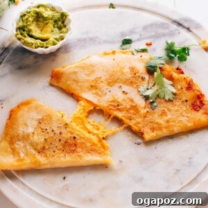 Cheese quesadilla on a plate.