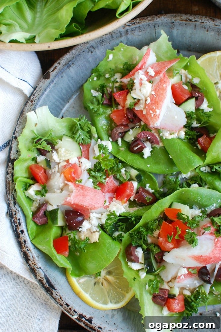 Refreshing Mediterranean Surimi Wraps 2 Delicious Mediterranean Surimi Lettuce Wraps artfully arranged, showcasing fresh ingredients and a healthy, appealing meal idea.
