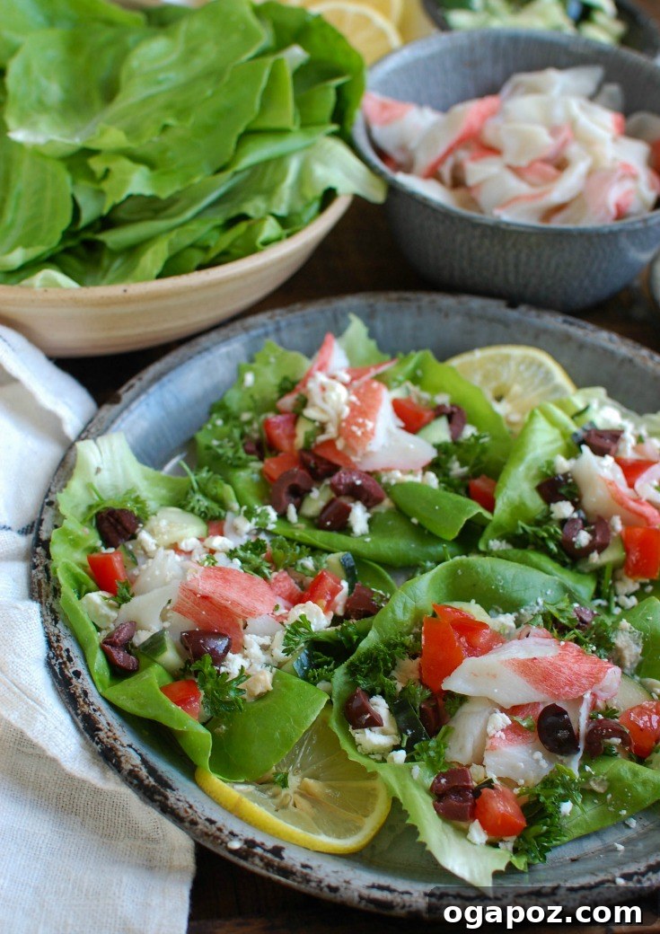 Refreshing Mediterranean Surimi Wraps 6 Beautifully prepared Mediterranean Surimi Lettuce Wraps on a platter, ready for serving.