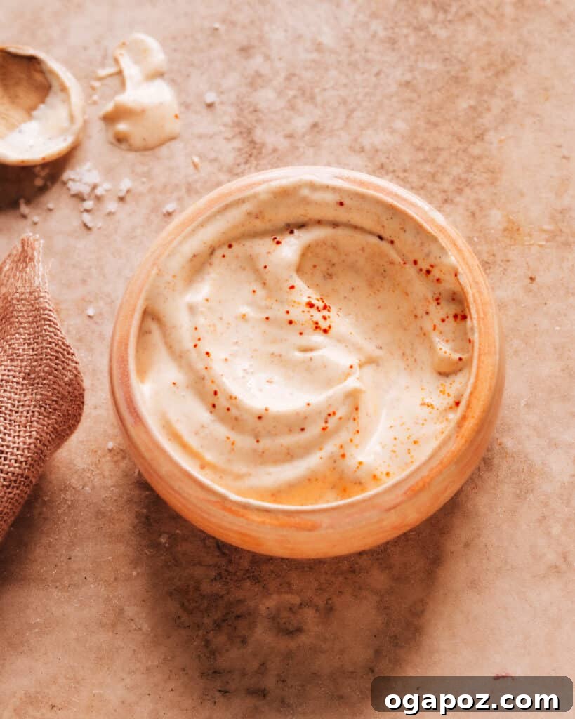 Delicious Creamy Baja Fish Taco Sauce 2 A bowl featuring freshly prepared Baja sauce, ready to add a burst of flavor to your fish tacos.