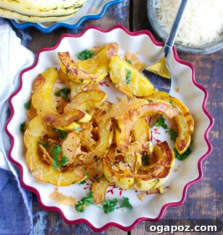 Parmesan Crusted Delicata Squash 3 Close-up of Delicata squash slices and shredded Parmesan cheese, ready for roasting.