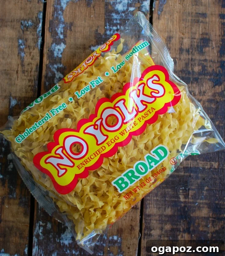 6 Noodle Hacks to Elevate Your Weekly Meals 4 A simple yet delicious Italian-style noodle dish with sauce, cheese, and basil.