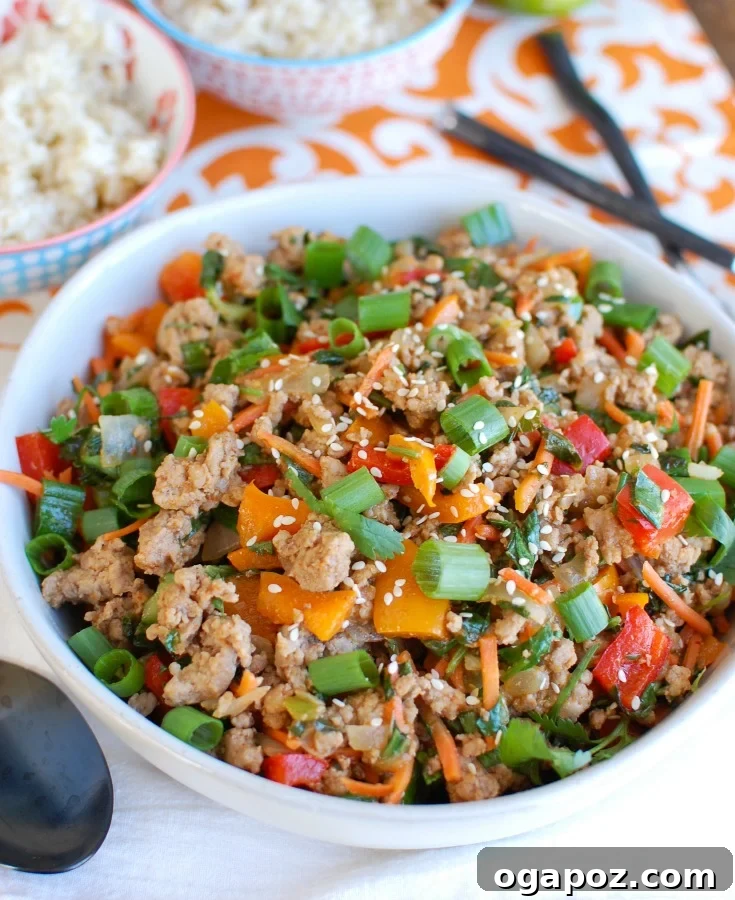 Easy Thai Pork Stir-Fry ingredients being prepped on a cutting board, emphasizing fresh vegetables and ground pork.