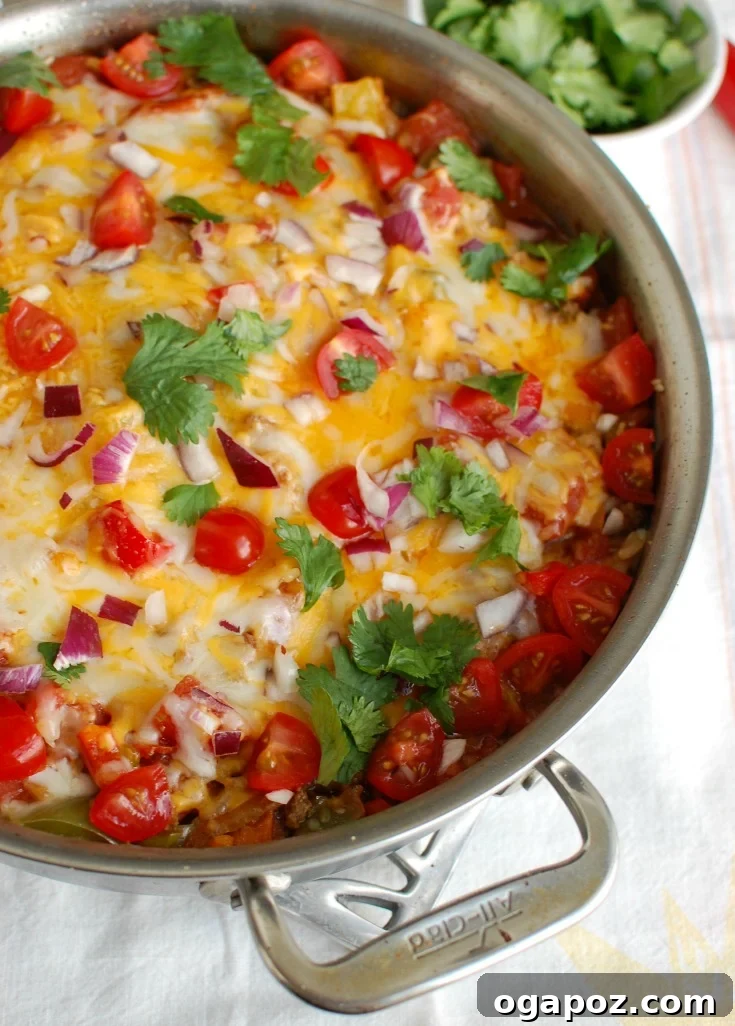 Skillet Mexican Unstuffed Pepper Bake 5 One Pot Mexican Stuffed Pepper Casserole garnished with fresh cilantro.