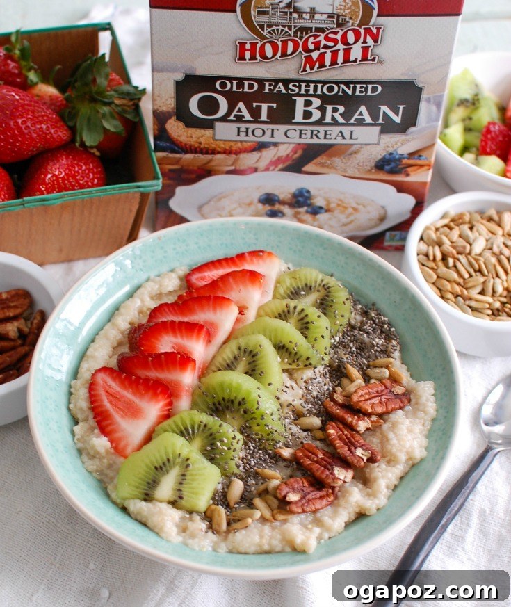 Vibrant Strawberry Kiwi Chia Oat Bran Bowl 5 A generously topped Strawberry Kiwi Chia Seed Oat Bran Bowl with fresh strawberries, kiwi slices, chia seeds, pecans, and sunflower seeds.