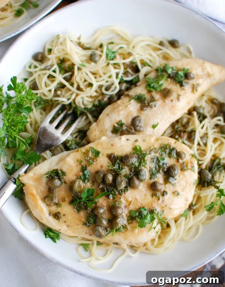 Zesty Lemon Caper Chicken 3 Close-up of Chicken Piccata garnished with fresh parsley, ready to be served.
