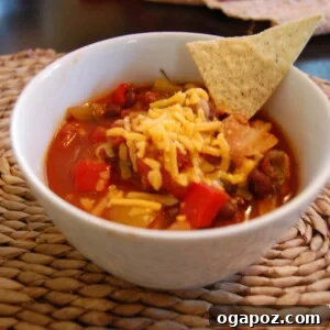 Comforting Plant-Based Chickpea Chili 2 Close-up of a bowl of Crockpot Chickpea Chili, showing the texture and ingredients.