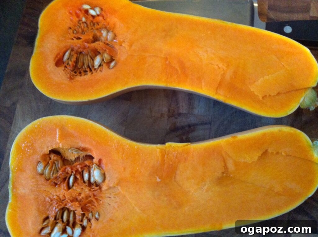 Butternut Squash Halves Two halves of butternut squash on a baking sheet