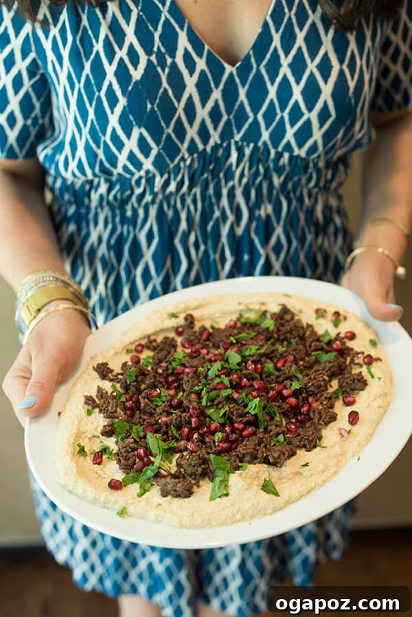 15 Mediterranean Appetizers to Delight Your Taste Buds 6 Warm Hummus with Ground Lamb & Pomegranate