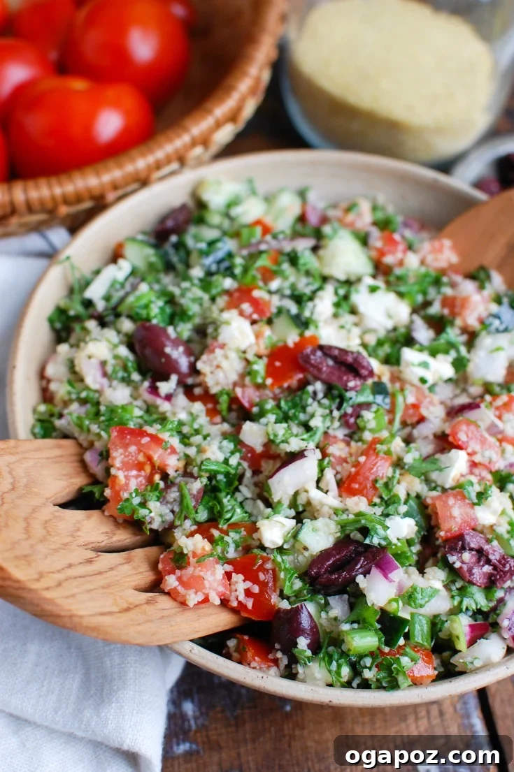 Vibrant Greek Tabbouleh Salad 4 Close-up of Greek Tabbouleh showing diced tomatoes and fresh herbs.
