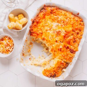 Golden Tater Tot Morning Bake 6 Tater tot breakfast casserole with a piece removed.
